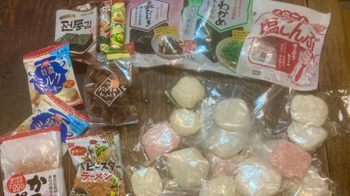 建前。上棟式の餅まき。