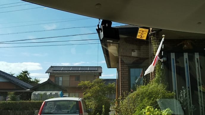 送迎の車中より
