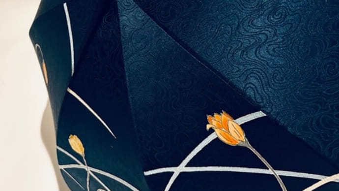 「春の日傘」