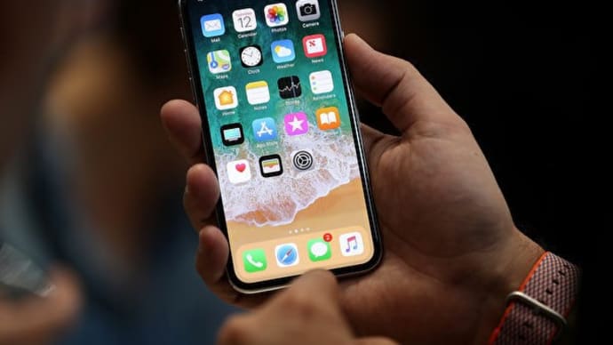 携帯電話使用で脳腫瘍リスク増加=研究
