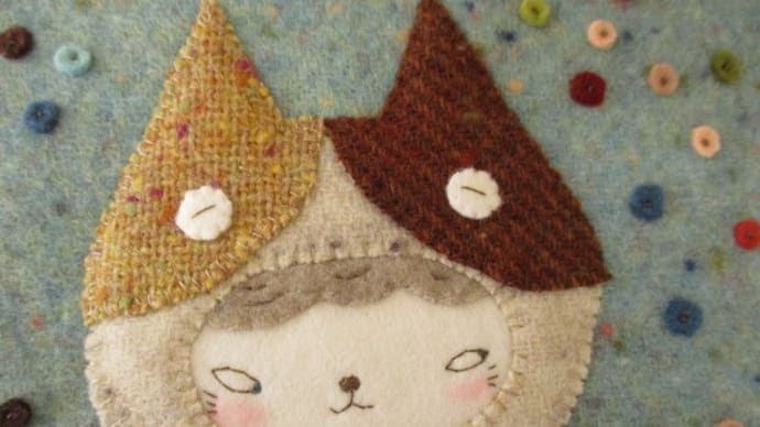 ハチワレ帽子の猫少年の財布