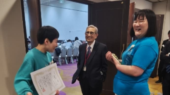 固い握手