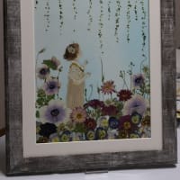 49額　春の花たちと少女