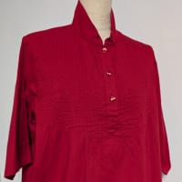 A vibrant red blouse in the hot summer