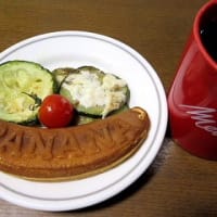 土手の草刈りを（自走式草刈り機にて）