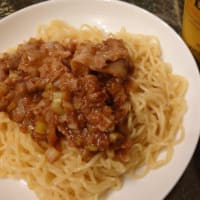 巻かれるポメ