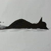 寝ている黒猫