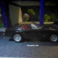 Woman in a Ferrari 365GTS/4 Spider with a turquoise handbag