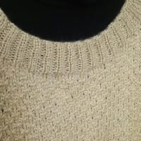 模様編みの黄色セーター