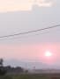 朝日と夕方の田