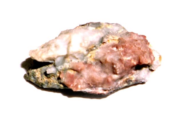 石灰岩採石場跡産の「鍾乳石を置換した菱マンガン鉱」