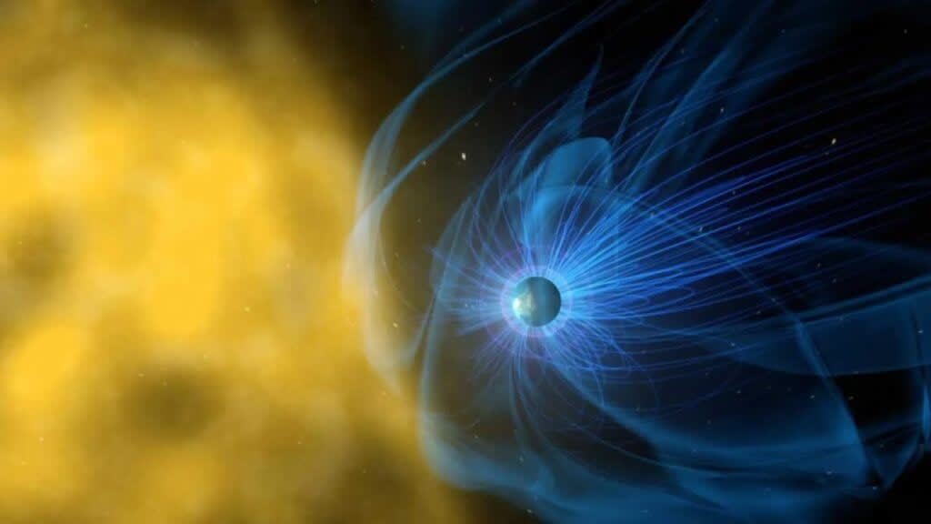 図1．有害な太陽風を遮断する地磁気は、生命と大気の両方にとってシールドの役割を果たしている。（Credit: NASA）